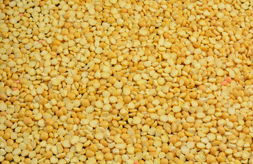 Close up of dry raw yellow split peas 
