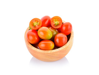 Small tomatoes isolated on white background.