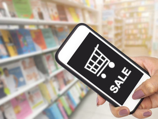 Abstract blur background of books on shelves