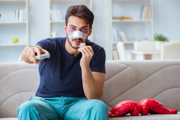 Young man defeated in sports game suffered loss with broken blee