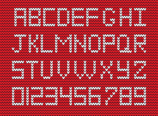 White knitted alphabet and numerals on red knitted background. Fabric knitted symbols and numbers for design. Vector illustration.