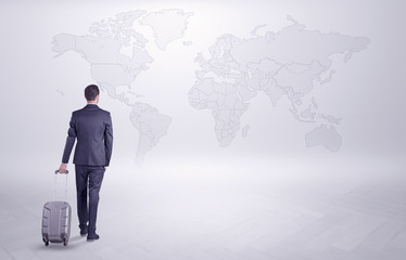 Businessman planning his trip over the world