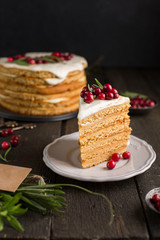 Honey nut ginger and carrot cake decorated with cranberries and rosemary. Perfect Christmas baked goods that you want to eat!)