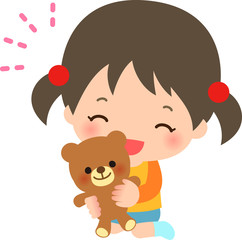 クマのぬいぐるみを抱いた女の子