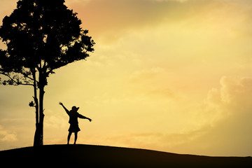 silhouette lady stand look at the sun