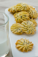 Homemade Sesame Butter Cookies and Glass of Milk.