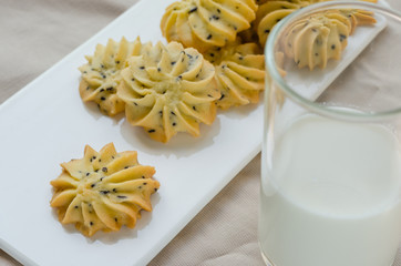 Homemade Sesame Butter Cookies and Glass of Milk.