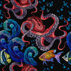 Embroidery octopus, sea wave and tropical fishes seamless pattern. Classical embroidery red octopus underwater, wave, fishes, seamless fashion pattern. Fashionable clothes, t-shirt design