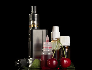 Electronic cigarette and set of aromatic liquids for smoking isolated on black background