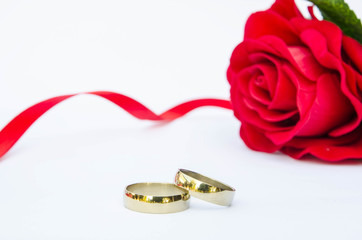 A pair of wedding rings suitable for use as a Valentine's Day background.