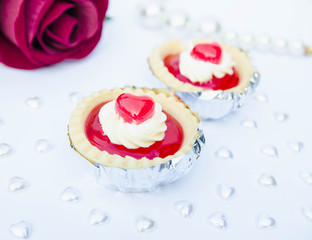 Strawberry tart berries are heart shaped jelly sweets tasty.