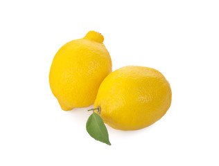 Lemon fruits with slices and green leaves isolated on white background