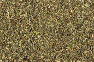 Fototapeta premium dried mint spice as a background, natural seasoning texture