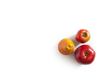 Red Apples and pear on white background