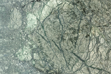 Green ooze waving on the river flow