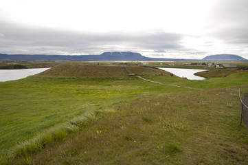 Lake Myvatn, Typical Icelandic landscape, a wild nature of rocks and shrubs, rivers and lakes.