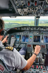 Pilot Landing a Plane