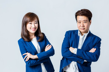 asian businessman and woman photoshoot in studio isolate background