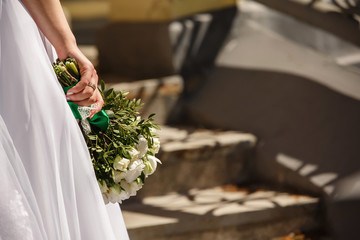 Bride holding wedding bouquet