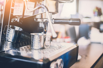 coffee making with coffee machine in cafe with color tone concept