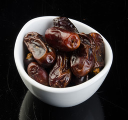 Dates, Dried dates on a background