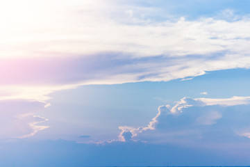 Naklejka na ściany i meble beautiful blue sky background with cloud and sunset light