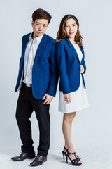 asian businessman and woman photoshoot in studio isolate background
