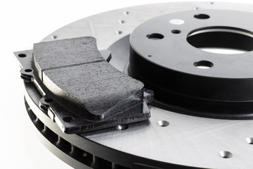 brake discs and pads on a white background