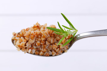spoon of cooked buckwheat