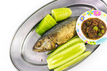 Fried mackerel with cucumber and Nam Prik on the long aluminium dish