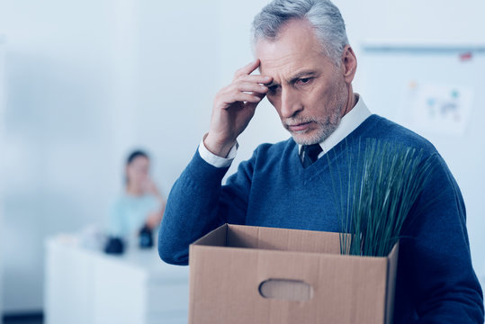 Stressed Retire Man Leaving His Office