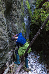 Photographer shooting landscapes in a canyon