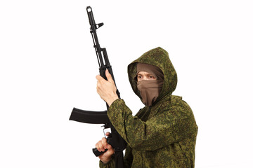 The man in a mask and a submachine gun in hands