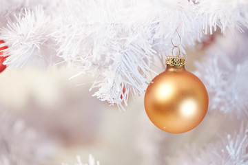 Red and Golden Christams Balls hanging on a white christmas tree - 178540583
