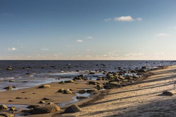 Fototapeta na wymiar The Gulf of Riga. It is a rocky shore, witness ice age.