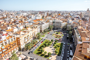 Top cityscape view on the old town with Reina main square in Valencia city during the sunny day in Spain