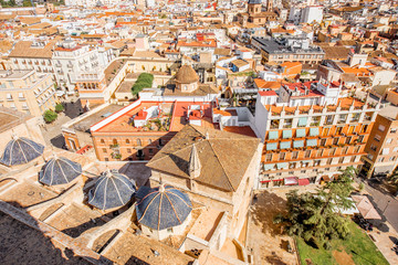 Fototapeta premium Top cityscape view on the old town with Basilica of our Lady of the Forsaken in Valencia city during the sunny day in Spain