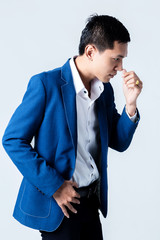 studio portrait of an asian businessman.