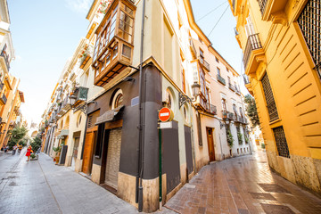 View on the beautiful street crossing at the old town of Valencia city in Spain