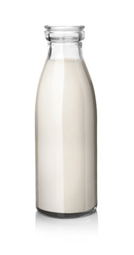 Glass Bottle Of Tasty Milk On White Background