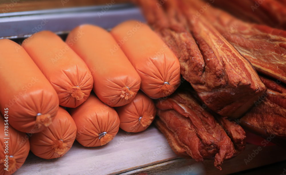 Sticker assortment of sausages on display at market