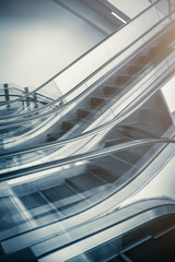 Close up to escalator yellow and gray steel line.