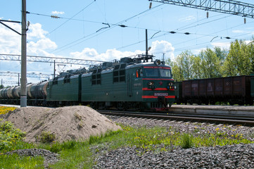 Fototapeta na wymiar Alternating current electric cargo locomotive VL80S-1062, station Kaduy, Vologda region, Russian Federation