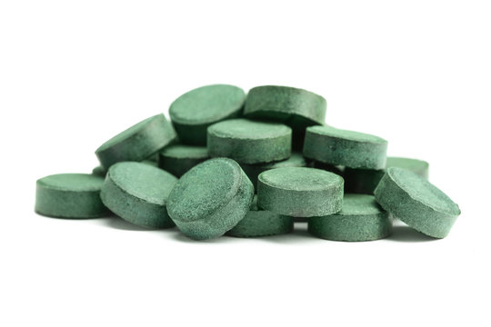 Spirulina Tablets On White Background