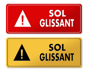 Slippery Floor warning panels in French translation