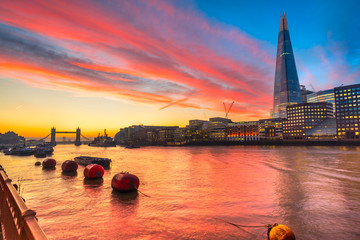 sunset over London, with the Shard and London Bridge. London, UK
