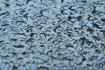 Water drops on mirror glass background