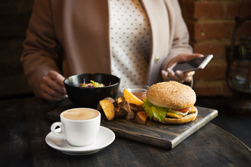 woman having lunch at a cafe