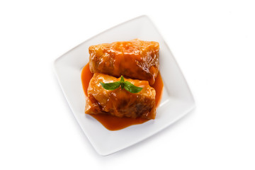 Wrapped meat with tomato sauce