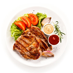 Grilled steaks and vegetables